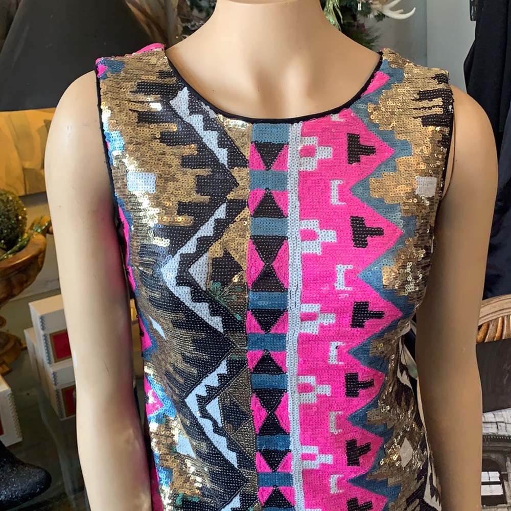GB dress size M.